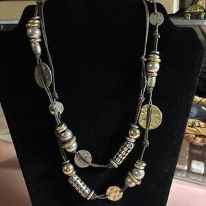 Silver and Gold beaded necklace with leather cord 36-inch necklace